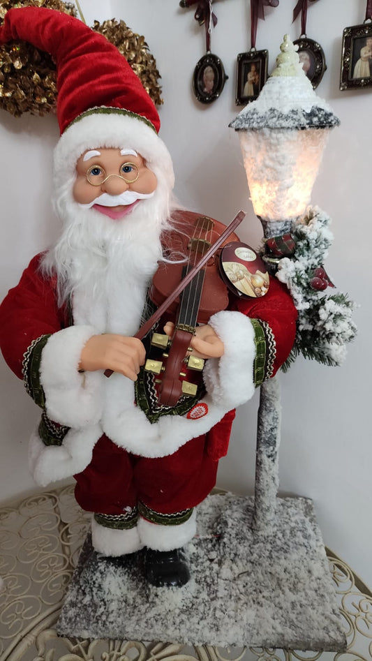 BABBO NATALE COLLEZIONE CON LAMPIONE E MUSICHE